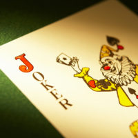 CLECKHEATON, WEST YORKSHIRE, UK: JOKER PLAYING CARD ON GREEN CLOTH GAMING TABLE, CIRCA 2007, CLECKHEATON, WEST YORKSHIRE, UK