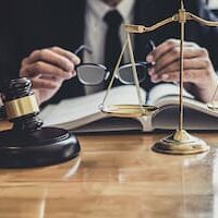 Why seek SMSF, tax or other advice from a lawyer –– are there any benefits? lawyer studying case