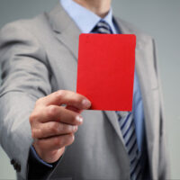 New ART decision sheds light — what can save an individual from SMSF disqualification stock-photo-showing-the-red-card-concept-for-bad-business-practice-exclusion-or-criminal-activity-201406001
